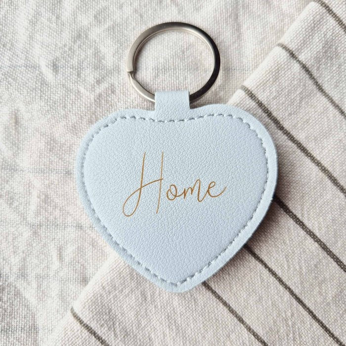 Sleutelhanger Hart Home - Blauw - Bibi Kidz - Kinderhaarspeldjes en baby accessoires voor pasgeboren baby bij Bibi Kidz, zachte babykleding, speendoekjes, spenen en gepersonaliseerde kraamcadeaus voor baby’s.